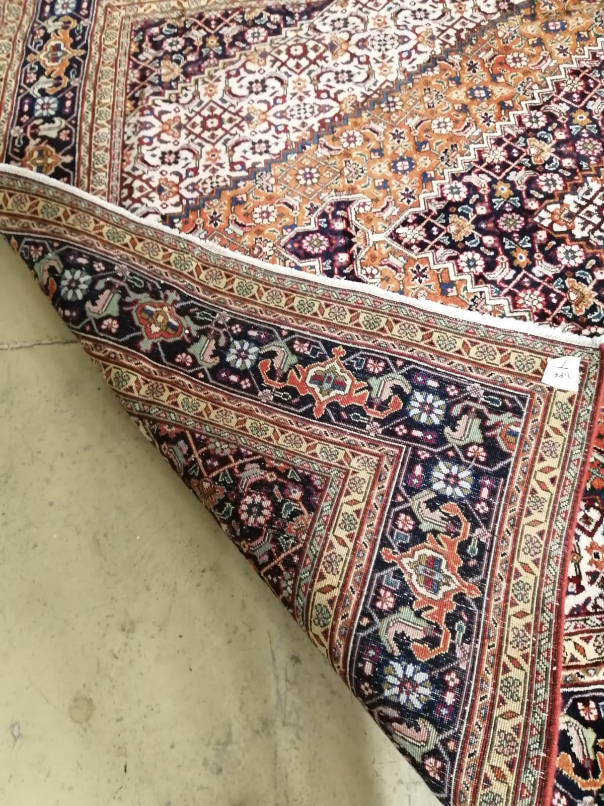 A Tabriz blue ground carpet, 285 x 205cm